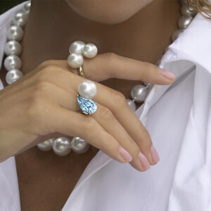 Model wearing Paisley South Sea Pearl and Aquamarine Ring