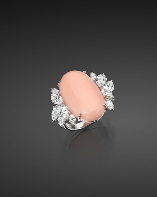 Single Angel Skin Coral Oval Cabochon 25.6 x 16.1 x 8.1mm set in an 18K White Gold Ring with 10 Diamonds, 3.86 cts
