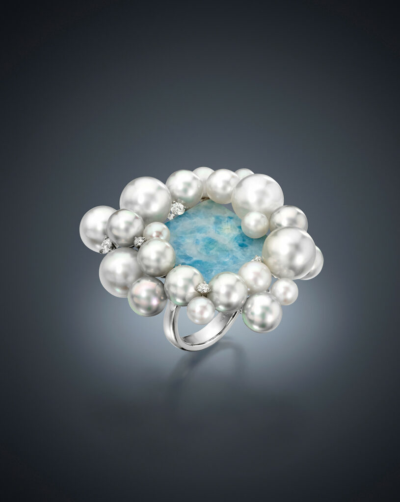 5 South Sea Cultured Pearls, 10 Akoya Cultured Pearls, and 9 Blue Akoya Cultured Pearls. The glorious pearls were then given a sprinkling of Diamonds to complete this heavenly Ring set in Platinum.