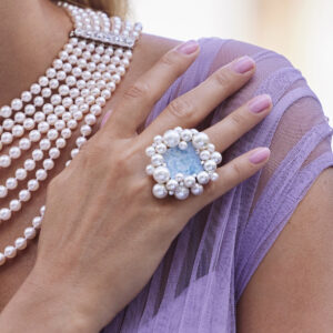 Model wearing Ring with Violane, South Sea Pearls and Blue & White Akoya Pearls