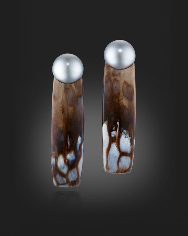 Legally-sourced Petrified Wood from Oregon, these remarkable Earrings have an organic, opalized pattern reminiscent of Mother of Pearl.
