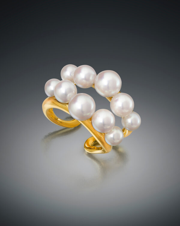 Ten lustrous Akoya Cultured Pearls double gold band by Sean Gilson for Assael.