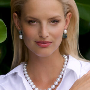 model wearing south sea and taihitian pearl earrings